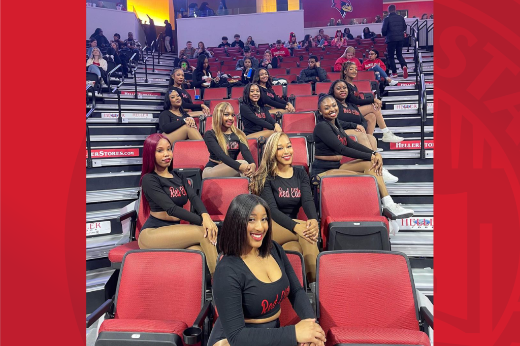 The Red Elite Dolls at a Redbird basketball game.