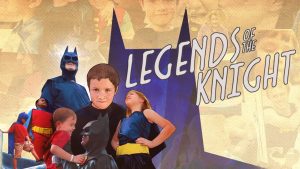 Batman and children in heroic poses